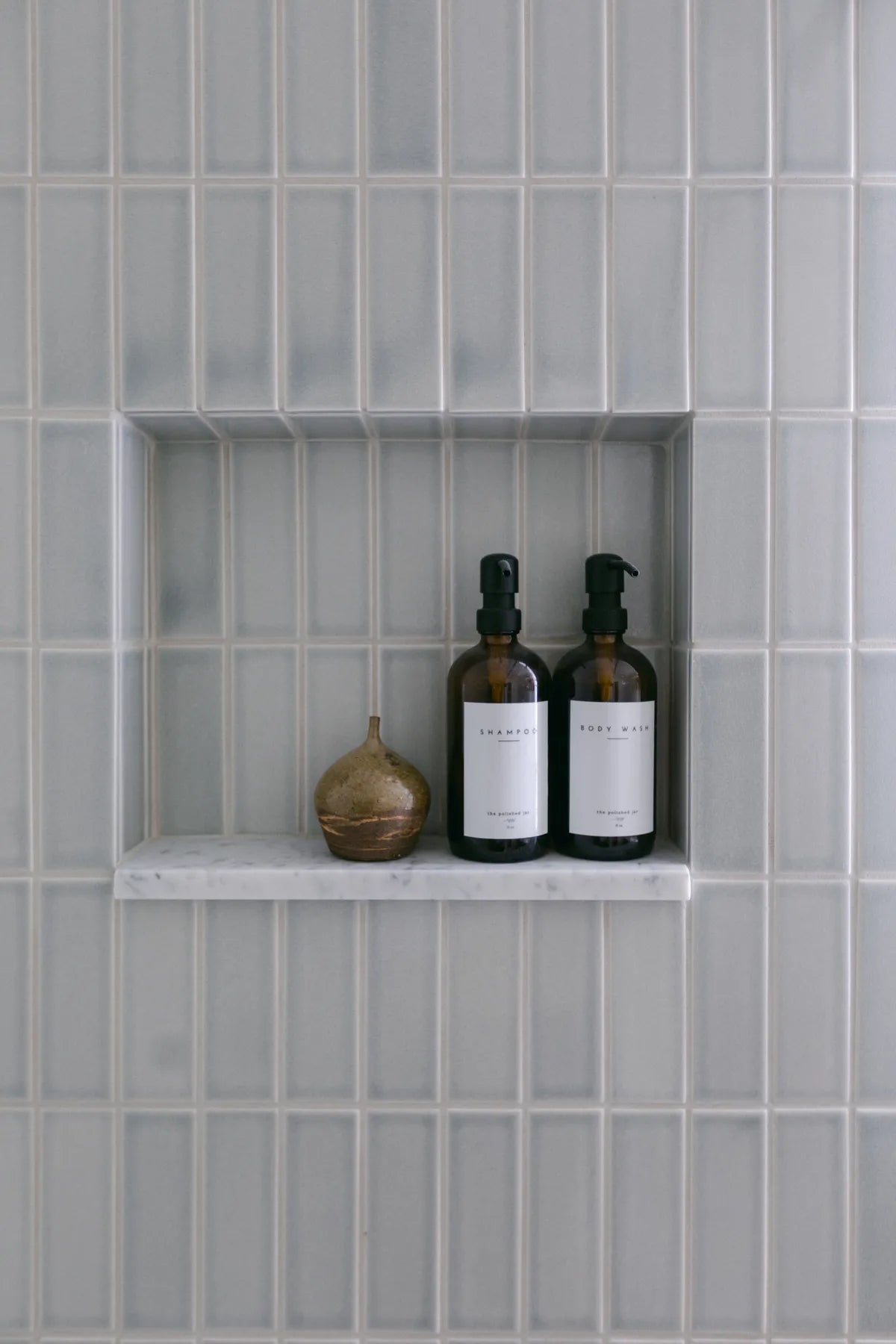 2019 IMG photo hi res influencer Taylor and Taylor photo tiffany studio Bathroom 2x6 foggy morning mist long short edge glazed trim white grout verticle set shower FC 318007 2