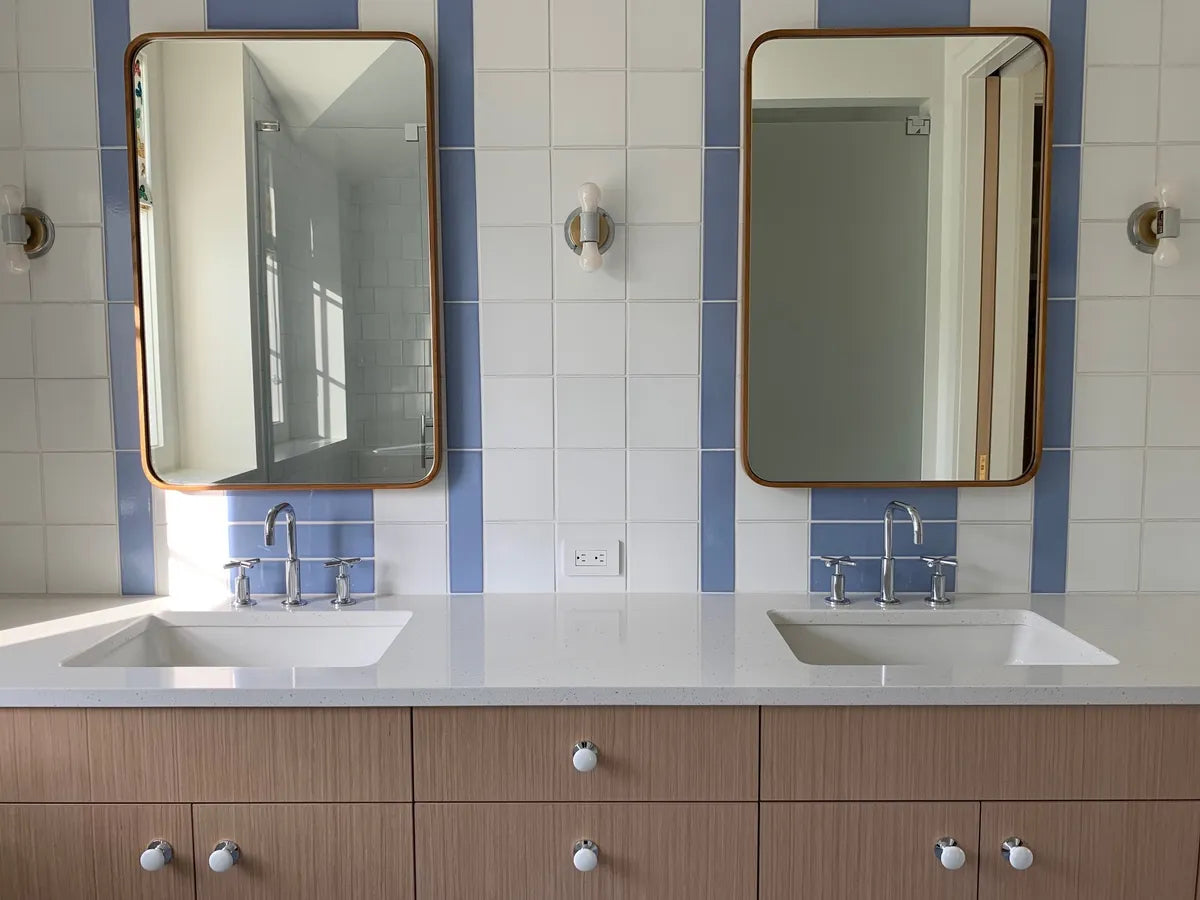 2021 IMG HI RES residential web only design photo leslie murchie bathroom backsplash 3x12 retired powder blue custom straight set backsplash verticle set floor6x6 white wash FC 320532 2