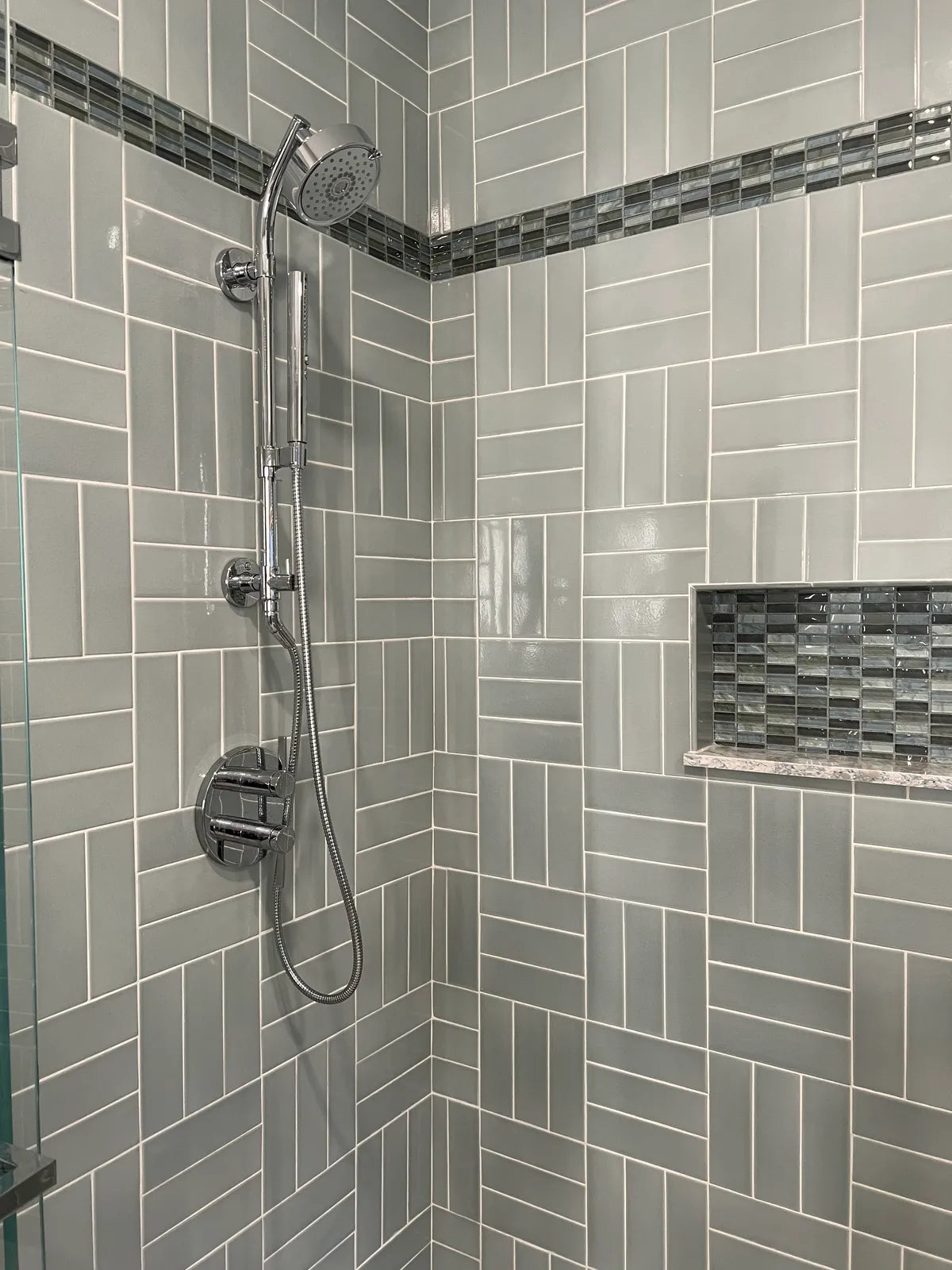 2022 img hi res web social residential design Eliza Bigelow photo shower parquet salton sea 3x9 1x6 round liner bullnose quarter round FC442253 1