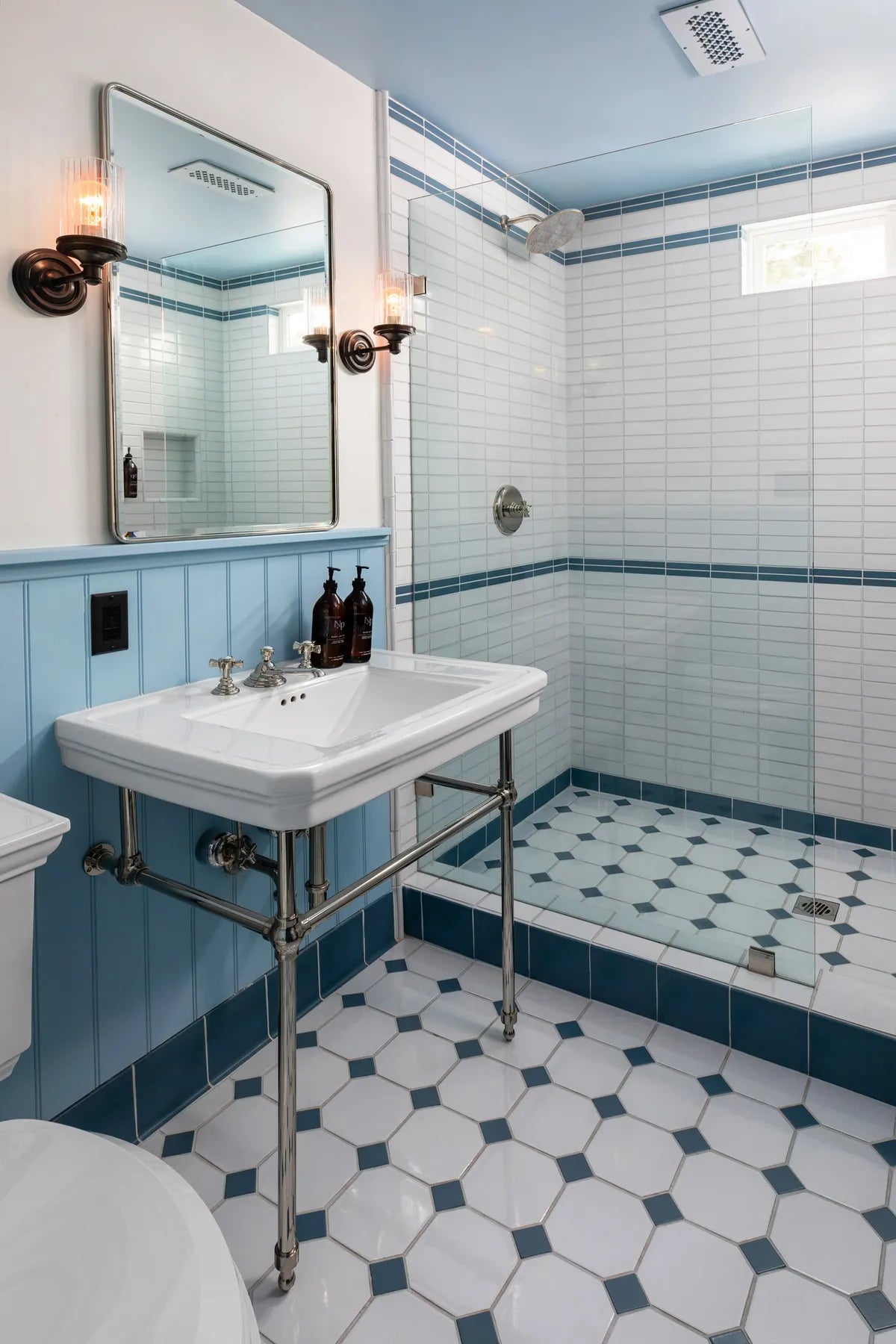 2022 img hi res full rights design handsome salt photo jenny seigwart noble proper cabin bathroom 6x6 white wash 2x2 cove base dusty blue shower 2x6 white wash shower niche