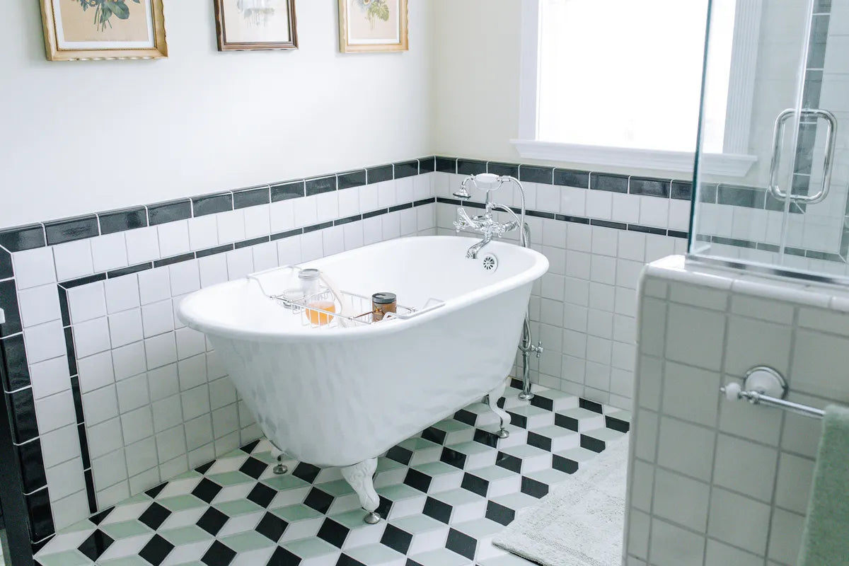 2022 img hi res residential influencer design emily vallely photo kim poppen bathroom floor large diamond seedling raven tusk shower wall 4x4 daisy quarter round raven and tusk flatliner raven Beak tusk 4