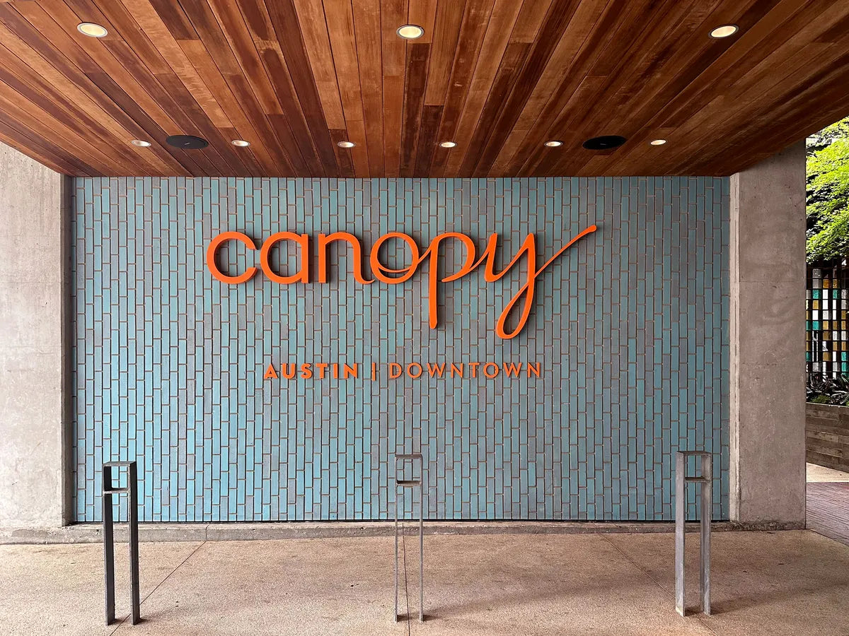 2023 img rights Design Lake flato Architects photo fireclay tile commercial installer hilton canopy exterior verticle set Allegheny Brick FC257754 1
