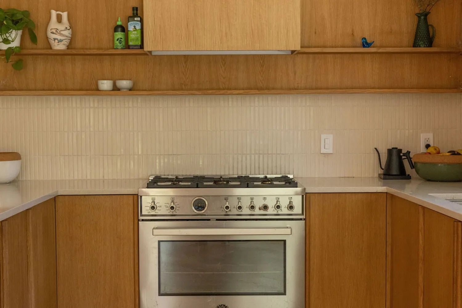 Kitchen backsplash trends 2024 organic modern warm neutral mosaic tile