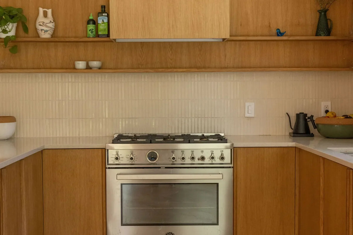 Kitchen backsplash trends 2024 organic modern warm neutral mosaic tile