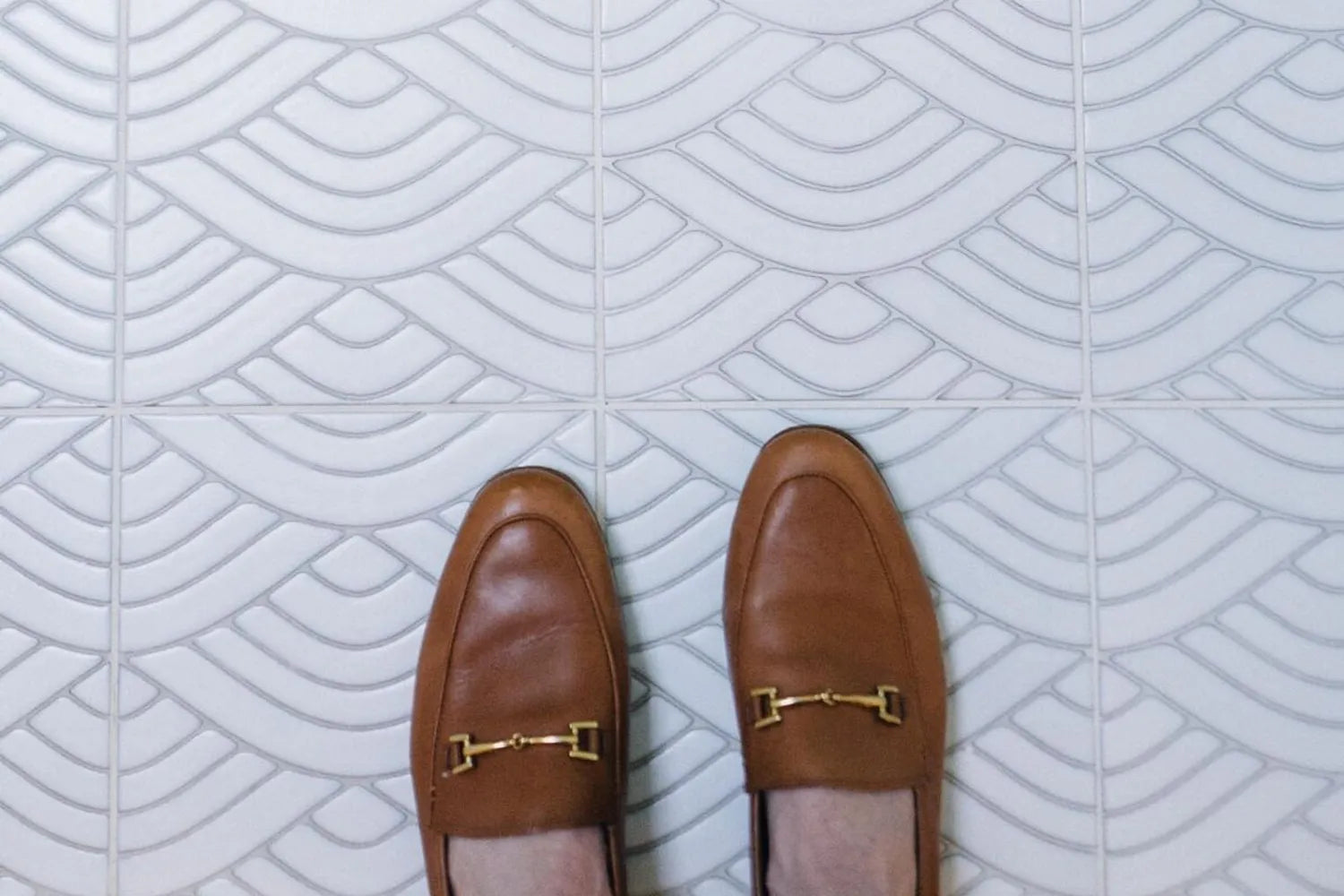 White floor tiles summit close up