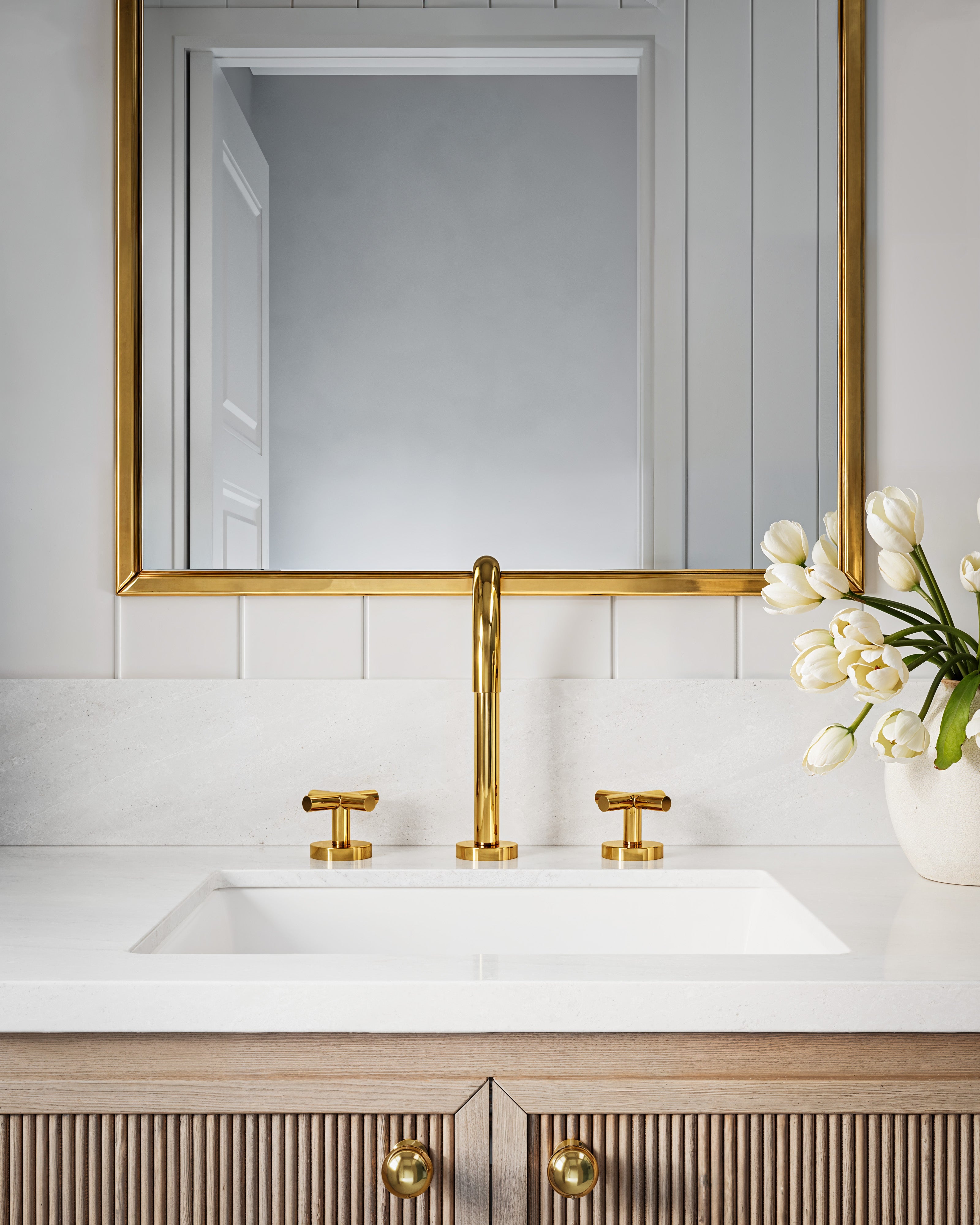 Contour Two Handle Deck Mount Gooseneck Lavatory Faucet with Soft Cross Handles in French Brass