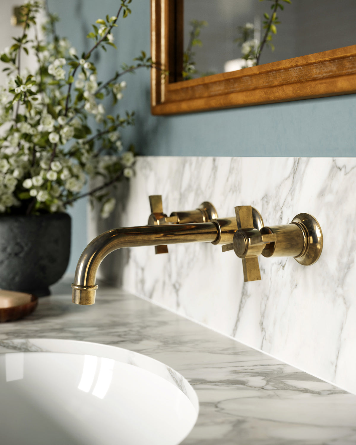Emerson Two Handle Wall Mount 8.25" Lavatory Faucet with Defined Cross Handles in Uncoated Polished Brass