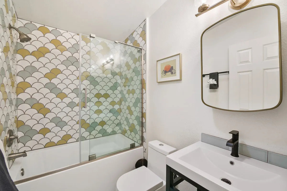 2019 IMG residential hi res Sonny Sabhlok photo Austyn Moreno full rights tangerine dream air b n b Shower accent wall Ogee drop White wash ogee drop frond ogee drop salton sea FC323085