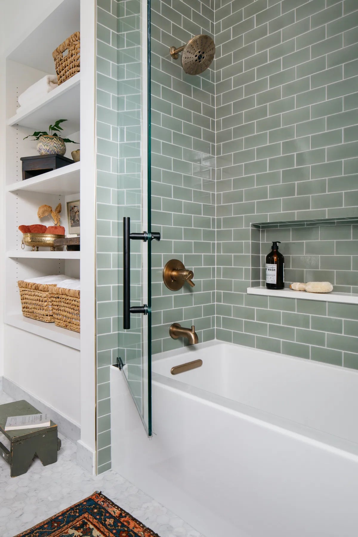 2021 IMG HI RES residential design Sarah Montgomery Photo Margaret Rajic FULL RIGHTS shower 3x6 rosemary straight offset white grout FC354544 1