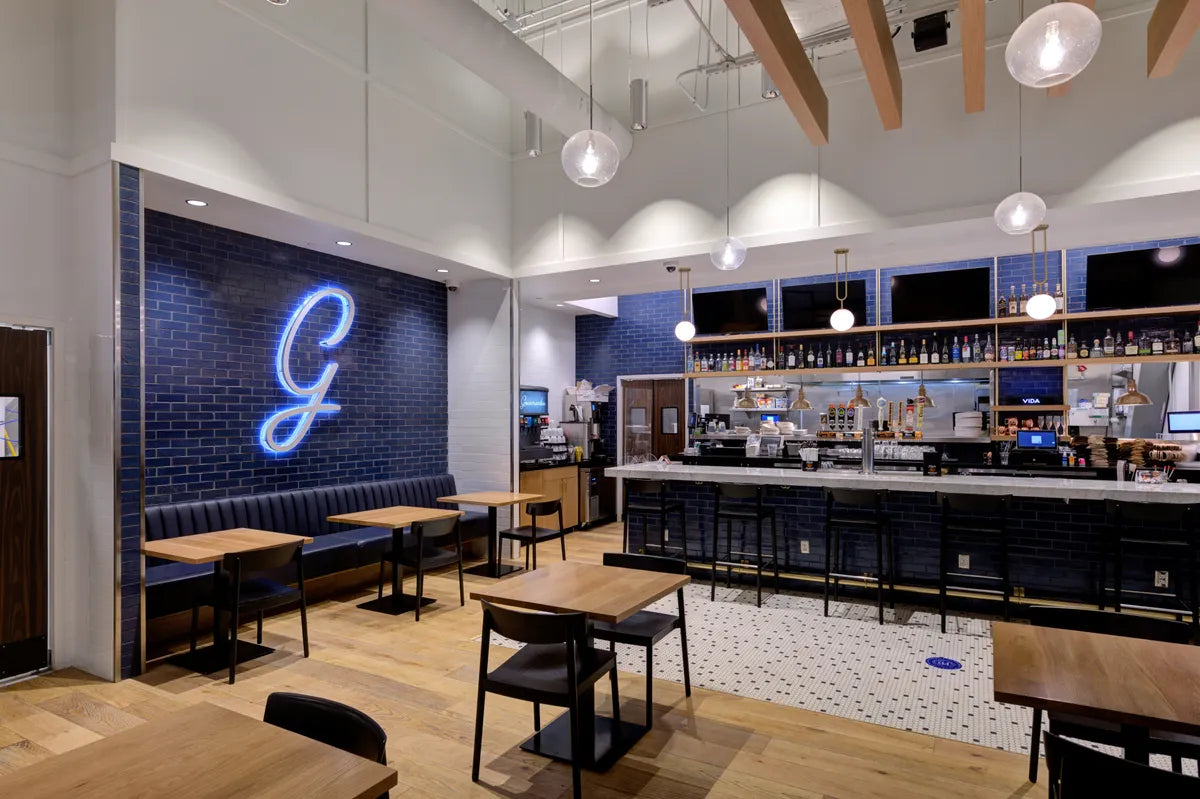 2021 IMG hi res Brurdock Desgn Commercial Salt lake city airport photo andrew shaw web use lounge blue ridge brick straight set offset white grout bar FC399912 1
