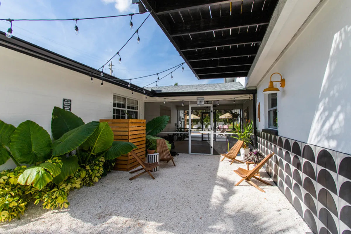 2021 img commercial full rights influencer design photos arrows and bow ashley petrone joie inn sage room hotel hospitality exterior wall handpainted agrarian fallow cool motif half moon pattern FC456459 2