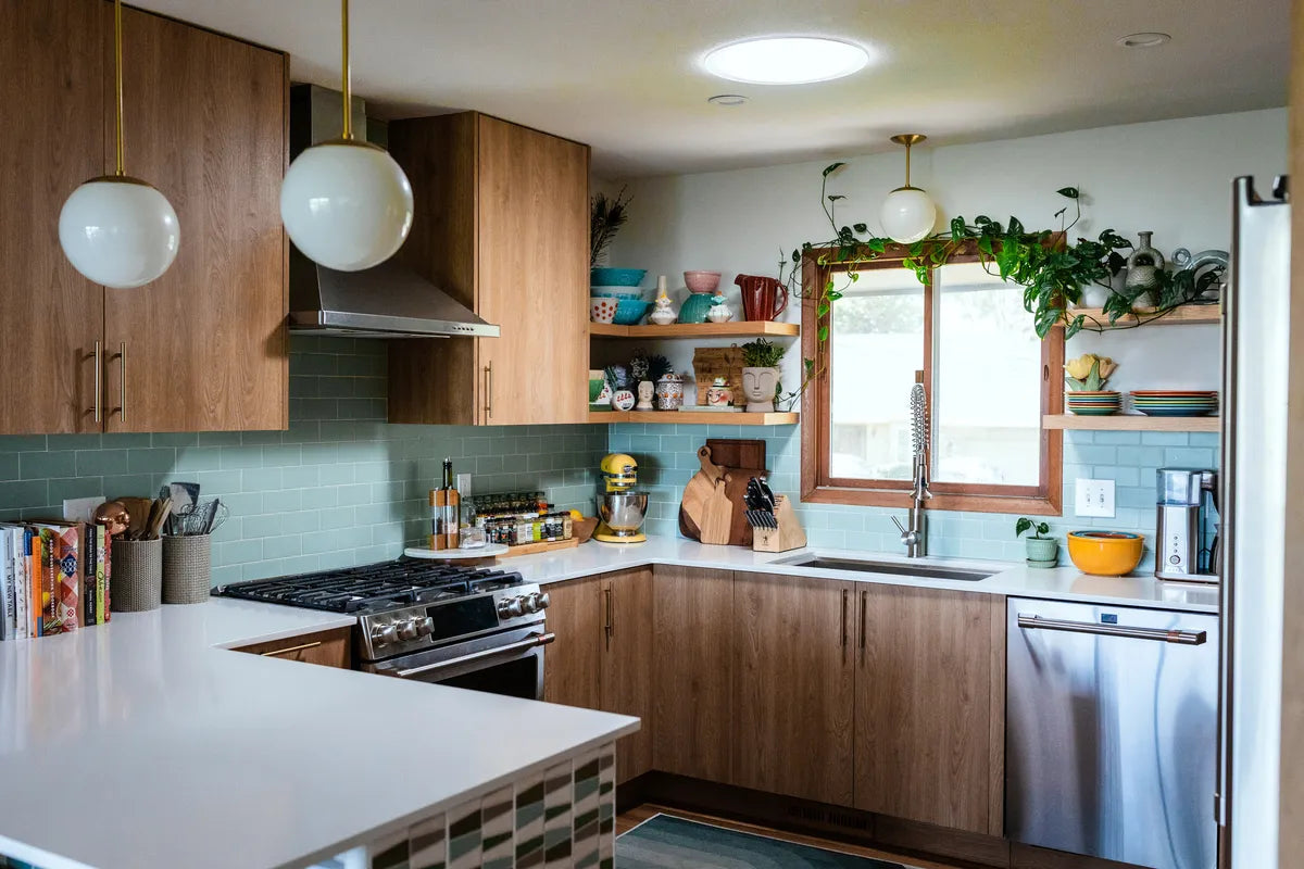 2022 img hi res residential rights desing emily vallely photo kim poppen kitchen backsplash offset 3x6 sea glass 1x6 quarter rounds counter riverrock green motif FC449440 3