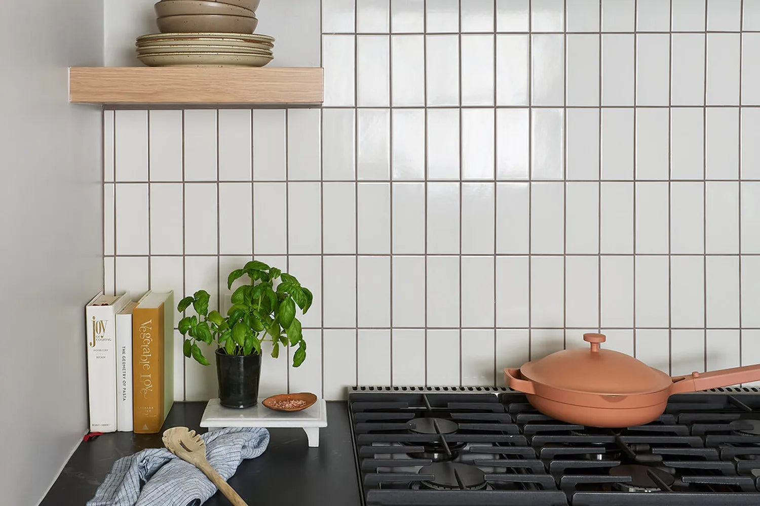 Warm white tile vertical subway tile backsplash LEAD