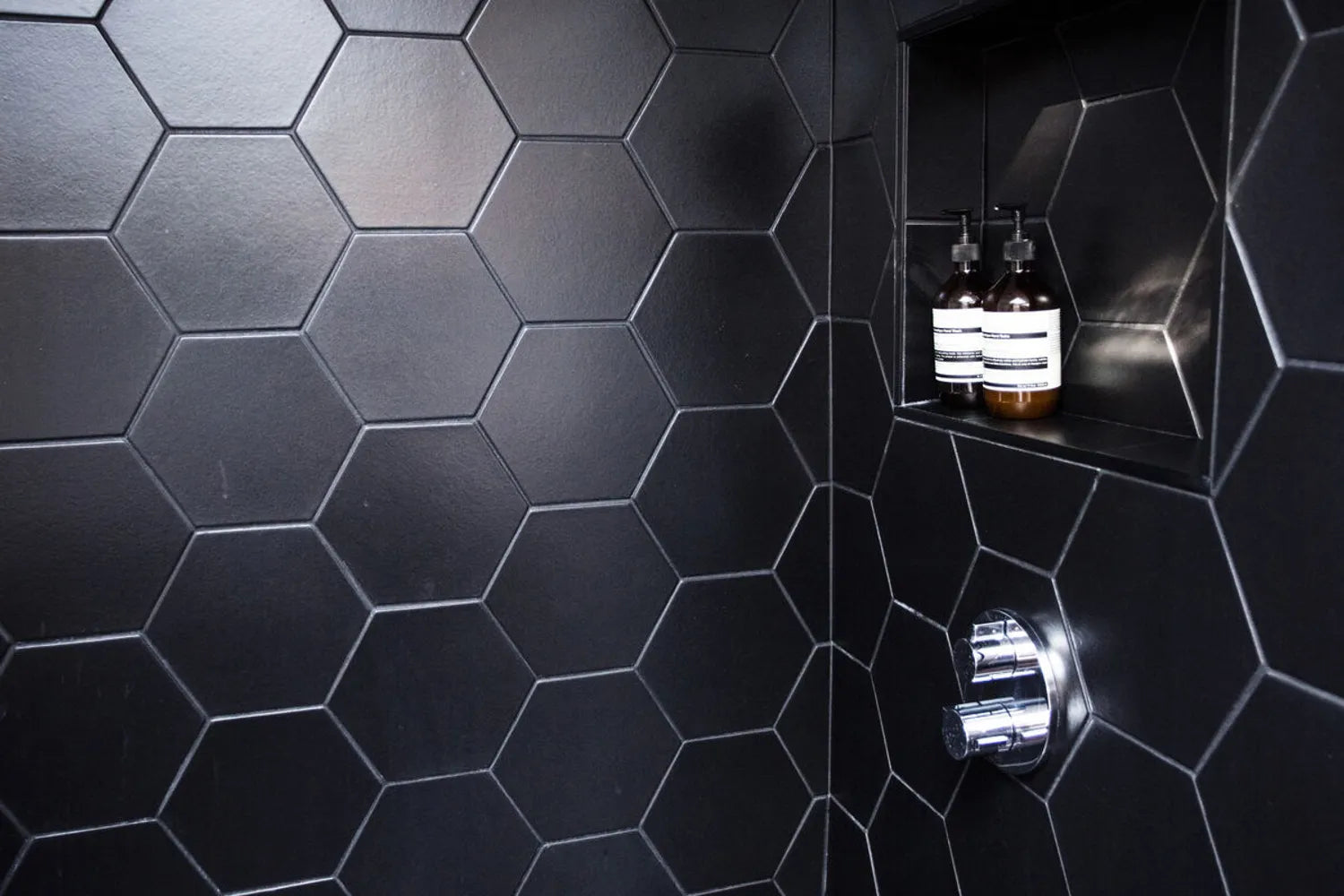 Black bathroom black hexagon shower tile