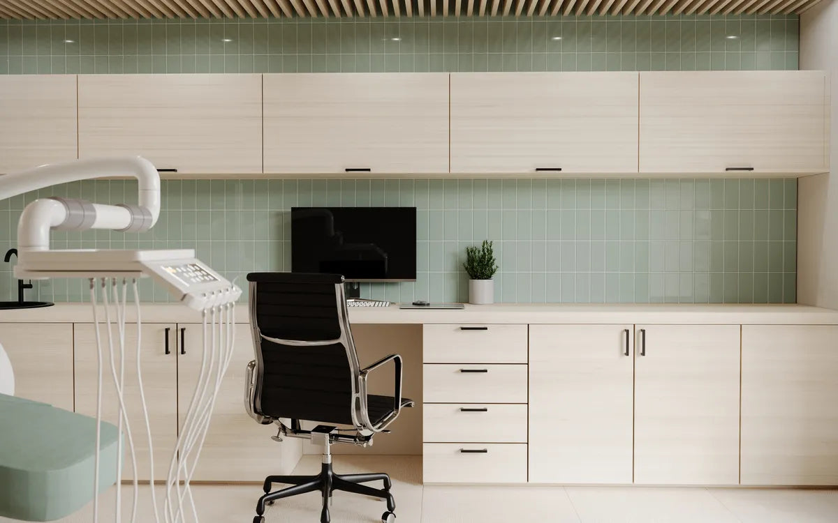 Modern exam room blue glass backsplash subway tile 1