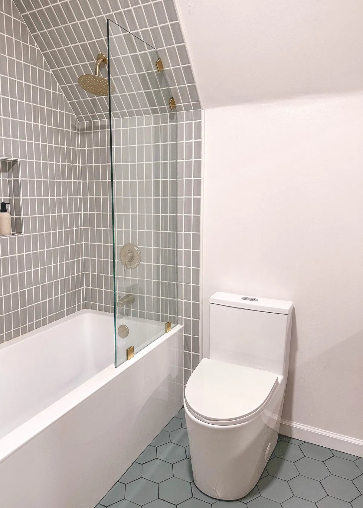Modern shower backsplash grey subway tile green floor hexagon tile 3