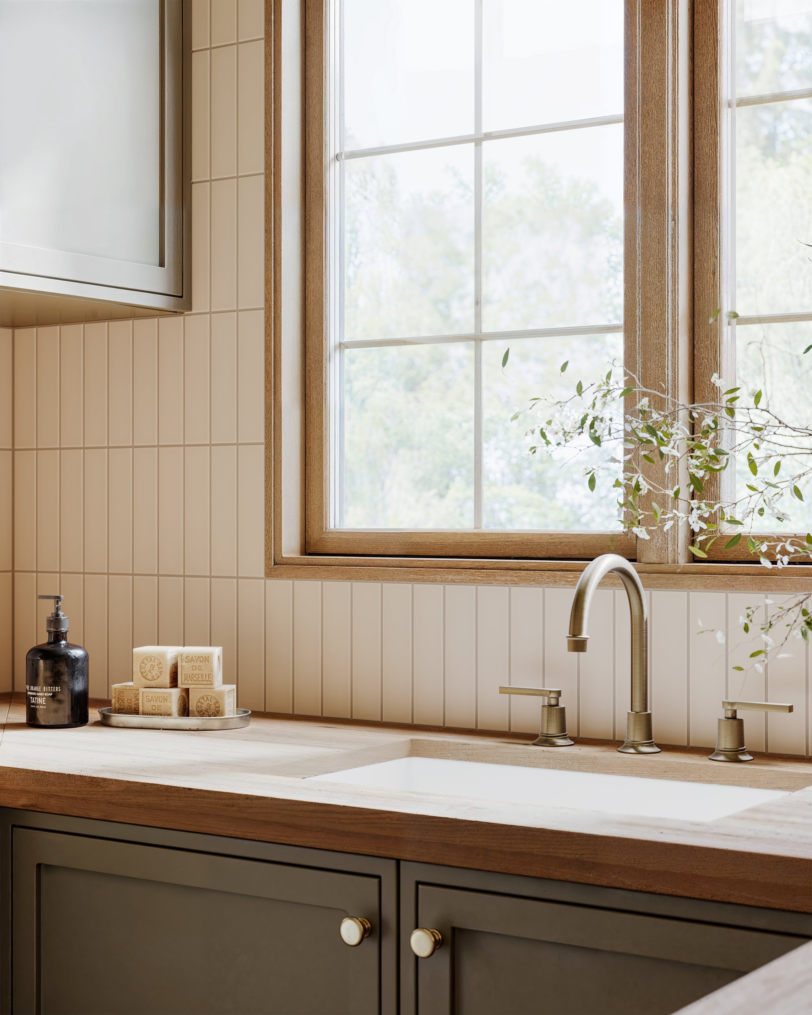 Emerson Two Handle Deck Mount Gooseneck Lavatory Faucet with Classic Lever Handles in Antique Brass
