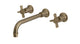 Emerson Two Handle Wall Mount 10" Lavatory Faucet with Defined Cross Handles in Antique Brass