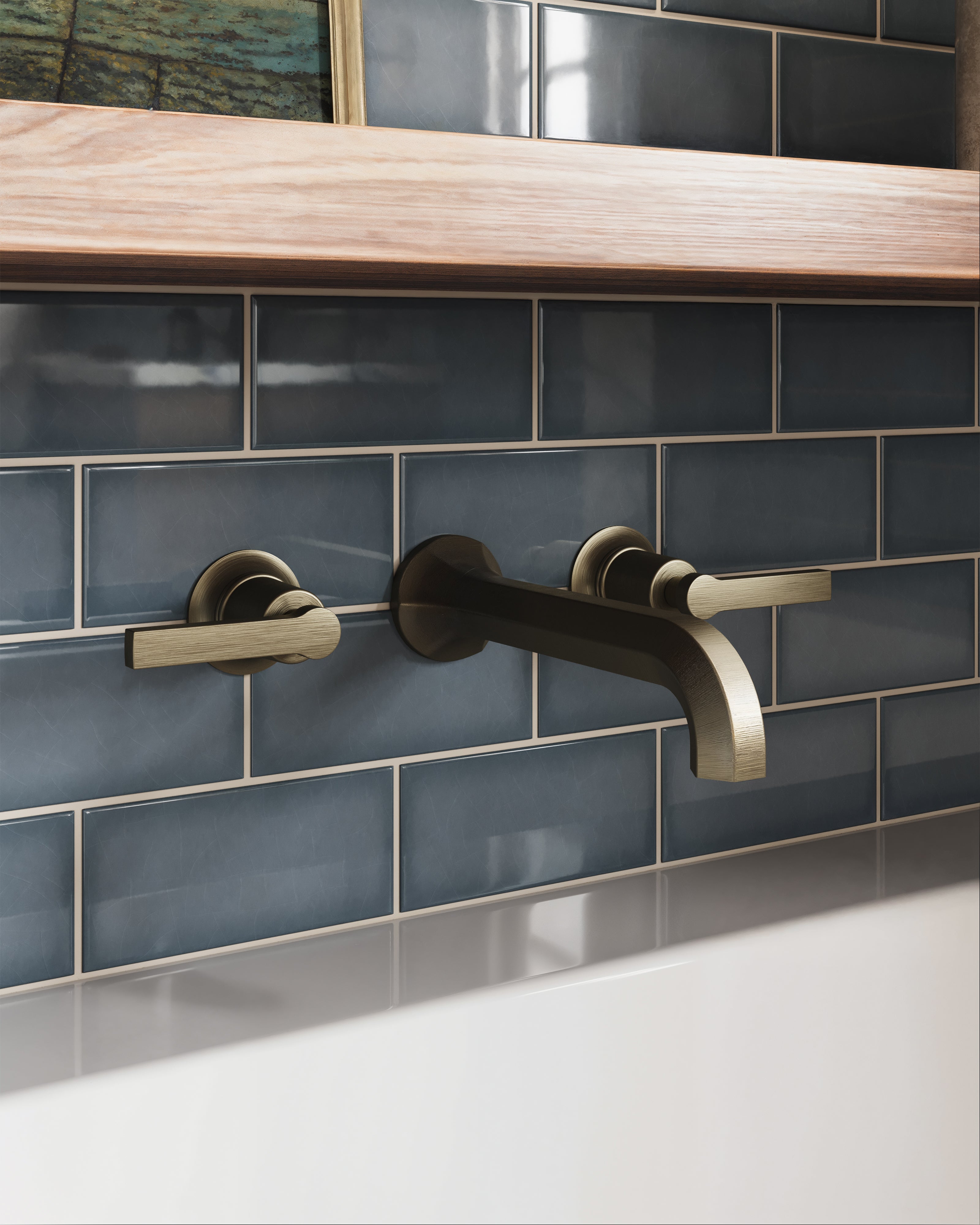 Emerson Two Handle Wall Mount Bath Trim with Classic Lever Handles in Antique Brass