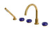 Foundry Three Handle Deck Mount Gooseneck Bath Trim with Hand Shower and Pebble Ceramic Knob Handles in French Brass