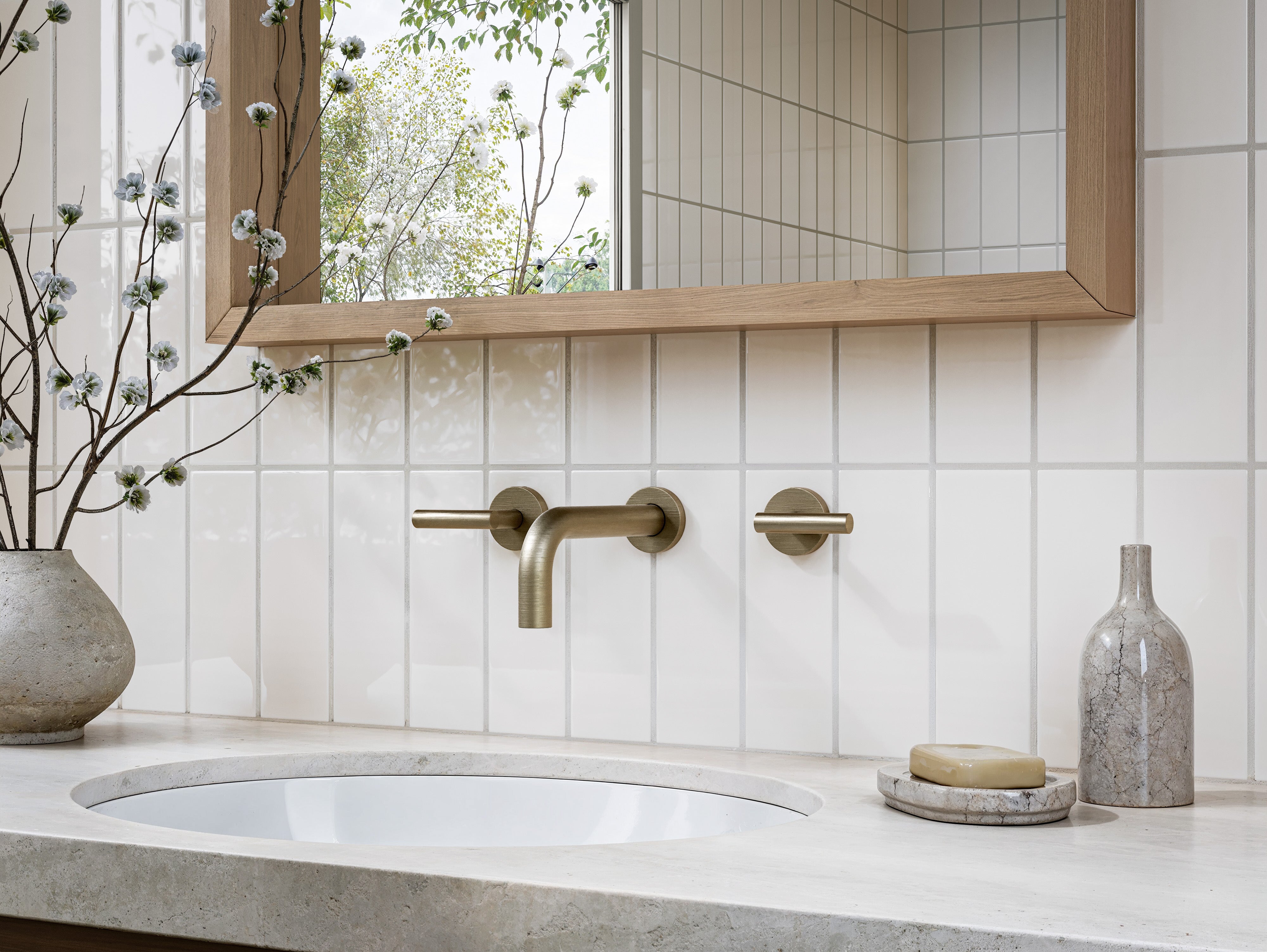 Contour Two Handle Wall Mount 7.5" Lavatory Faucet with Soft Lever Handles in Antique Brass