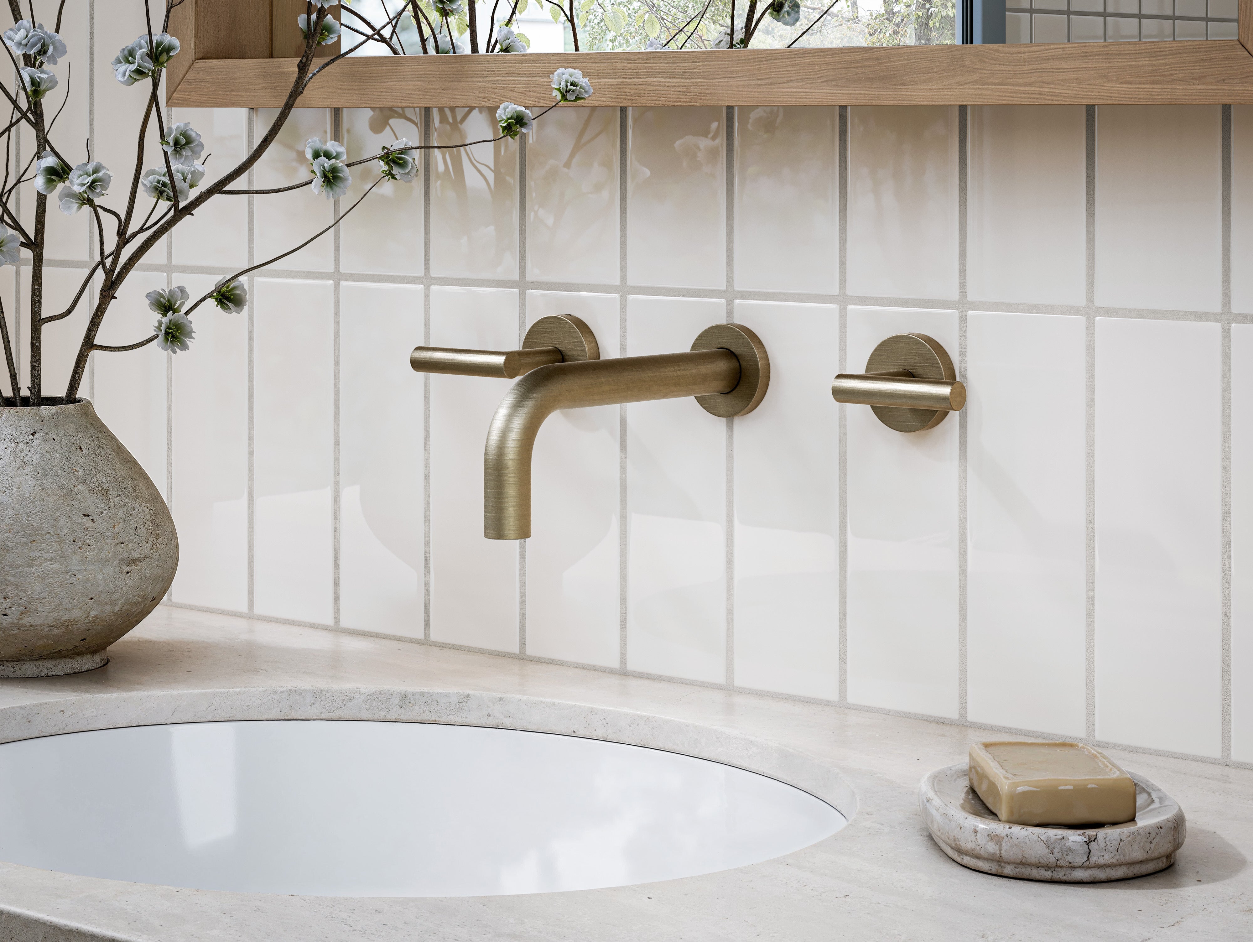 Contour Two Handle Wall Mount 7.5" Lavatory Faucet with Soft Lever Handles in Antique Brass