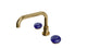 Foundry Two Handle Deck Mount Squaretop Bath Trim with Pebble Ceramic Knob Handles in Uncoated Polished Brass