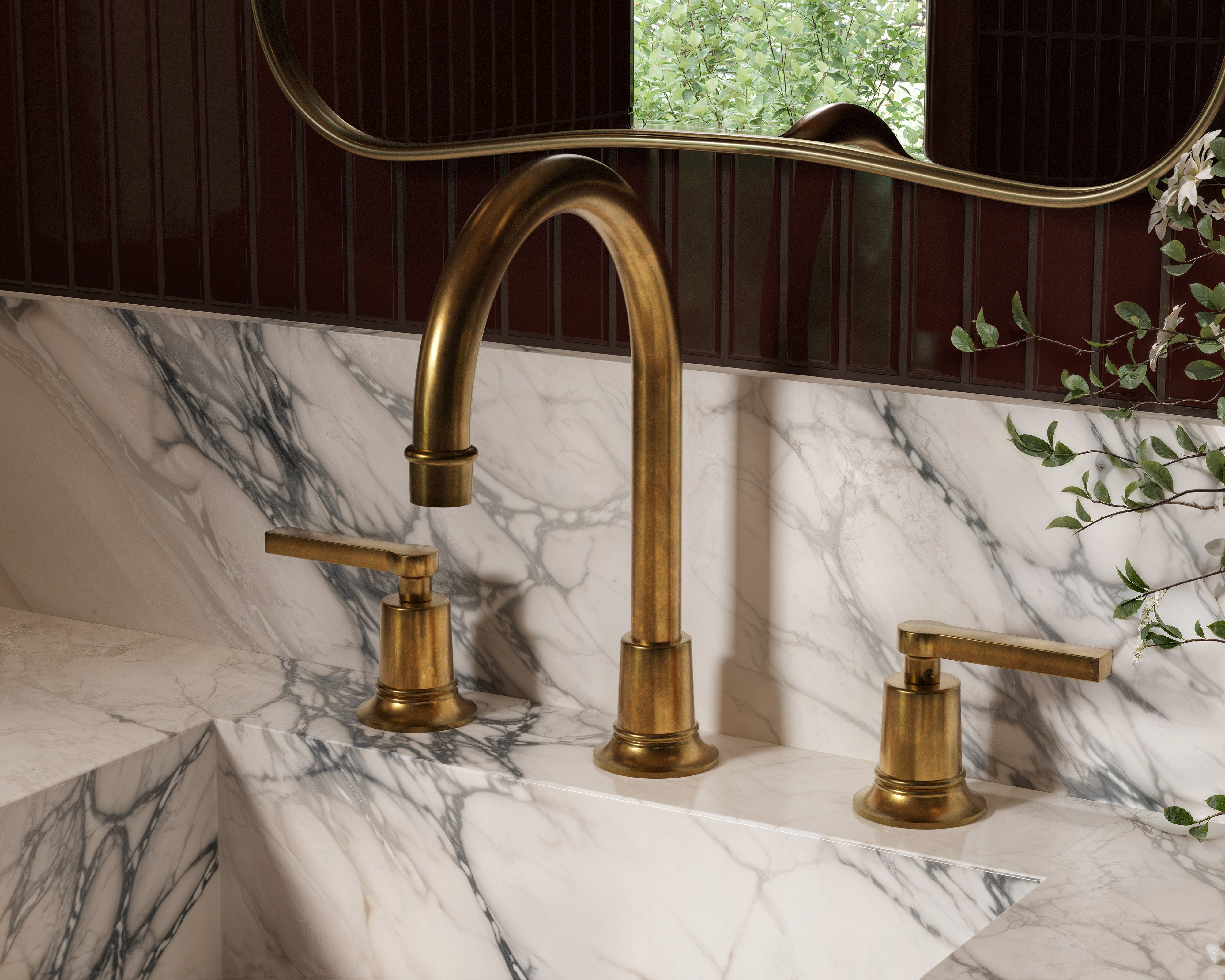 Emerson Two Handle Deck Mount Gooseneck Lavatory Faucet with Classic Lever Handles in Uncoated Polished Brass