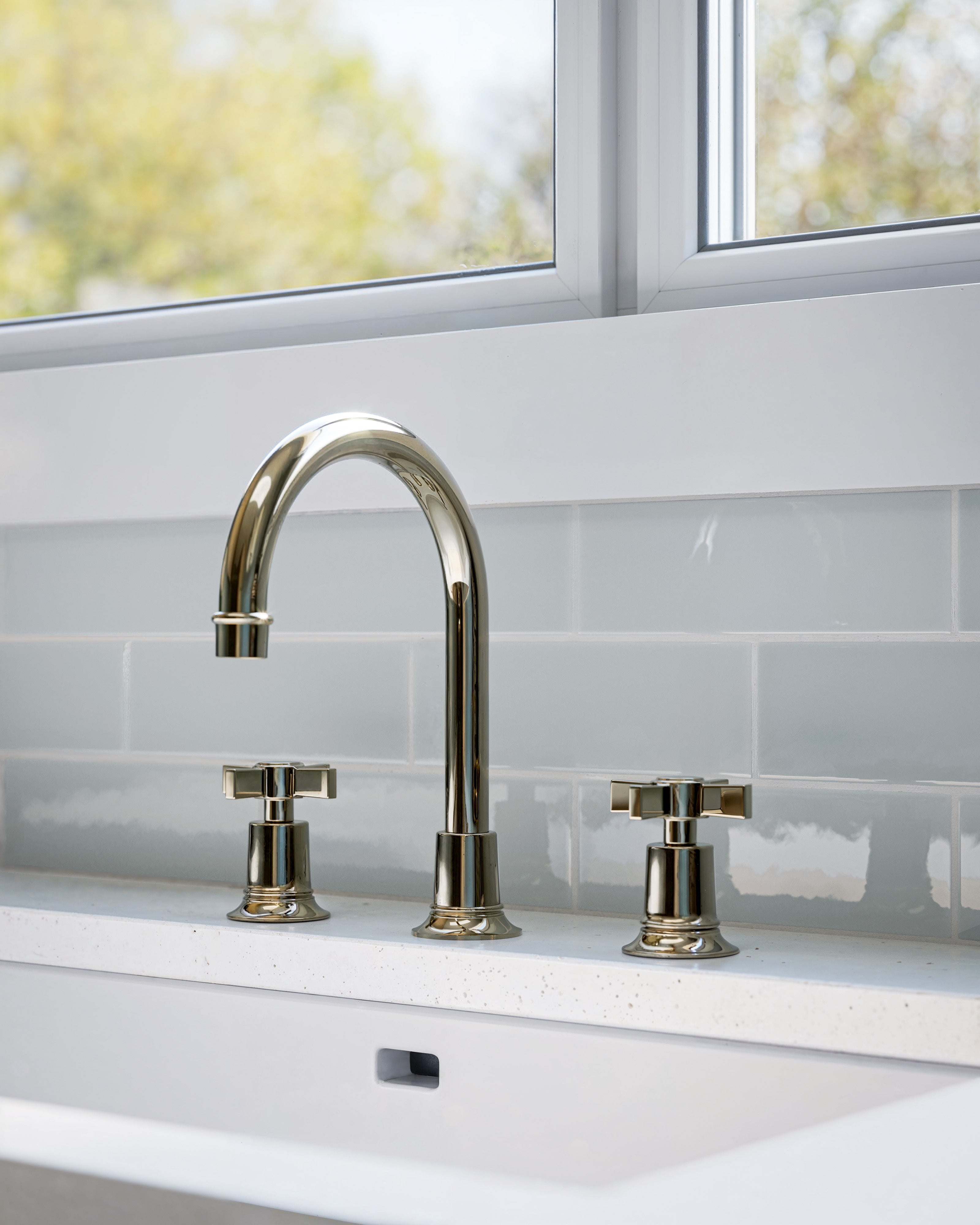 Emerson Two Handle Deck Mount Gooseneck Lavatory Faucet with Defined Cross Handles in Polished Nickel