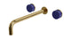 Foundry Two Handle Wall Mount 12" Lavatory Faucet with Groove Ceramic Knob Handles in Uncoated Polished Brass
