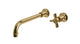 Emerson One Handle Wall Mount 10" Lavatory Faucet with Defined Cross Handle in Uncoated Polished Brass