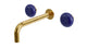 Foundry Two Handle Wall Mount 7.5" Lavatory Faucet with Pebble Ceramic Knob Handles in French Brass