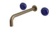 Foundry Two Handle Wall Mount 10" Lavatory Faucet with Pebble Ceramic Knob Handles in Antique Nickel