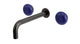 Foundry Two Handle Wall Mount 7.5" Lavatory Faucet with Pebble Ceramic Knob Handles in Antique Bronze