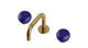 Foundry Two Handle Deck Mount Squaretop Lavatory Faucet with Pebble Ceramic Knob Handles in Uncoated Polished Brass