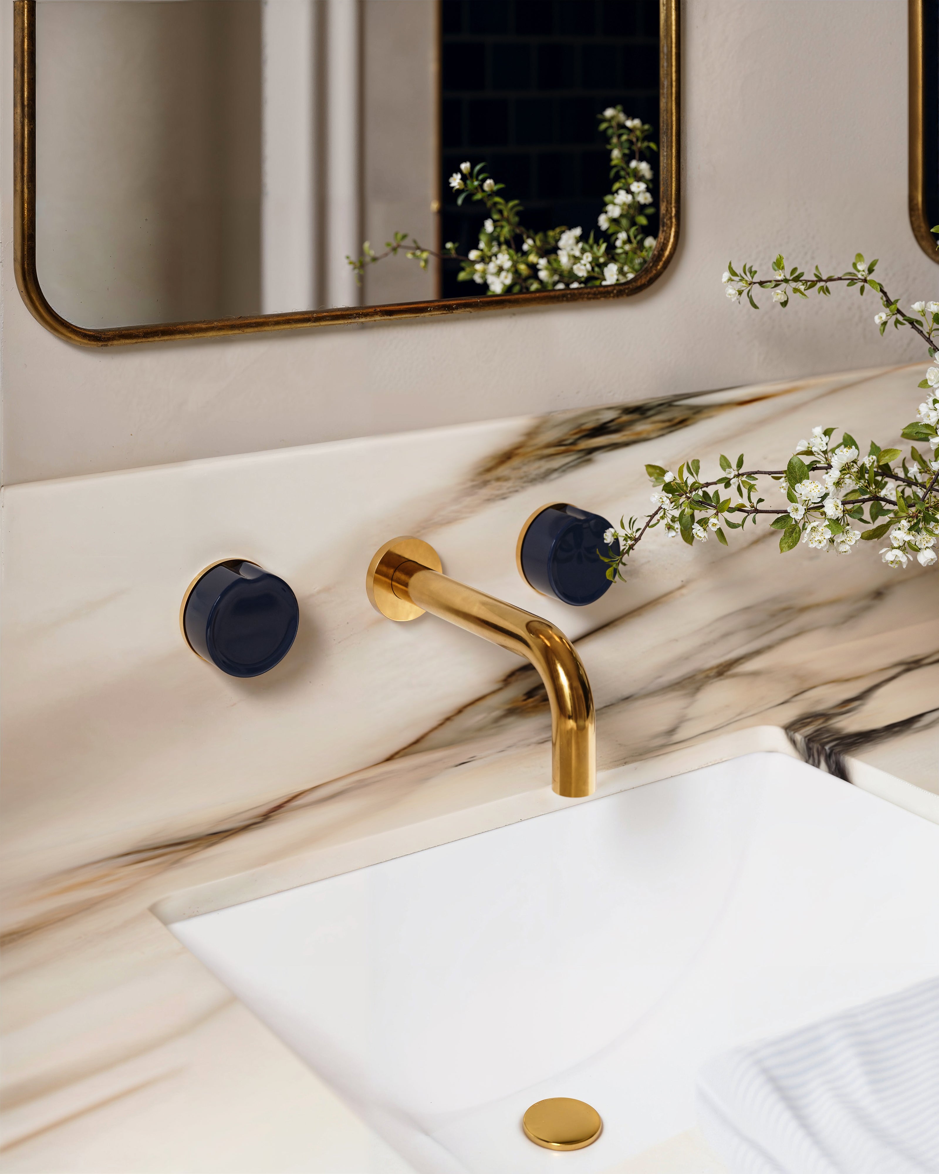 Foundry Two Handle Wall Mount 7.5" Lavatory Faucet with Groove Ceramic Knob Handles in French Brass