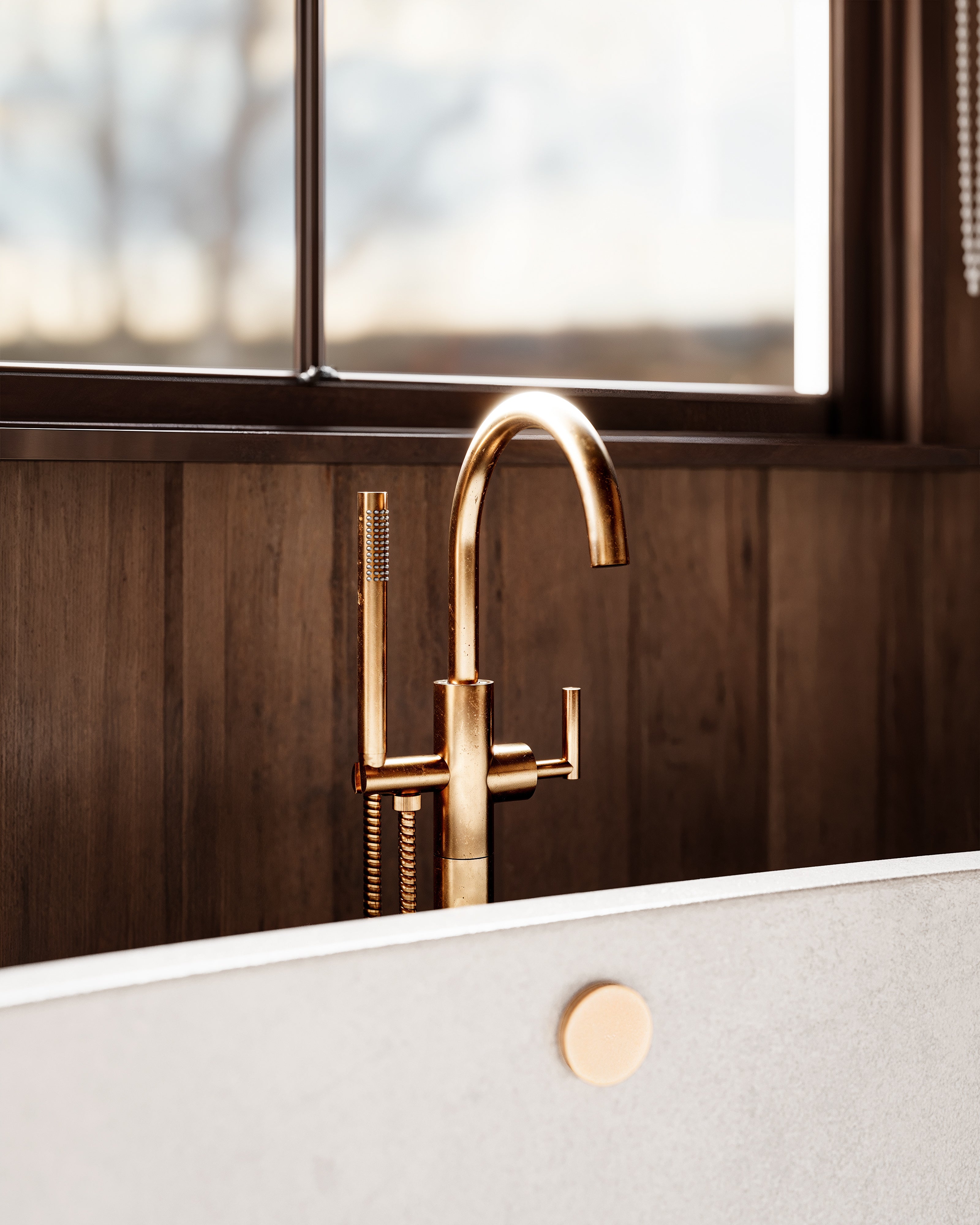 Contour One Handle Floor Mount Gooseneck Bath Trim with Hand Shower and Soft Lever Handle in Uncoated Polished Brass
