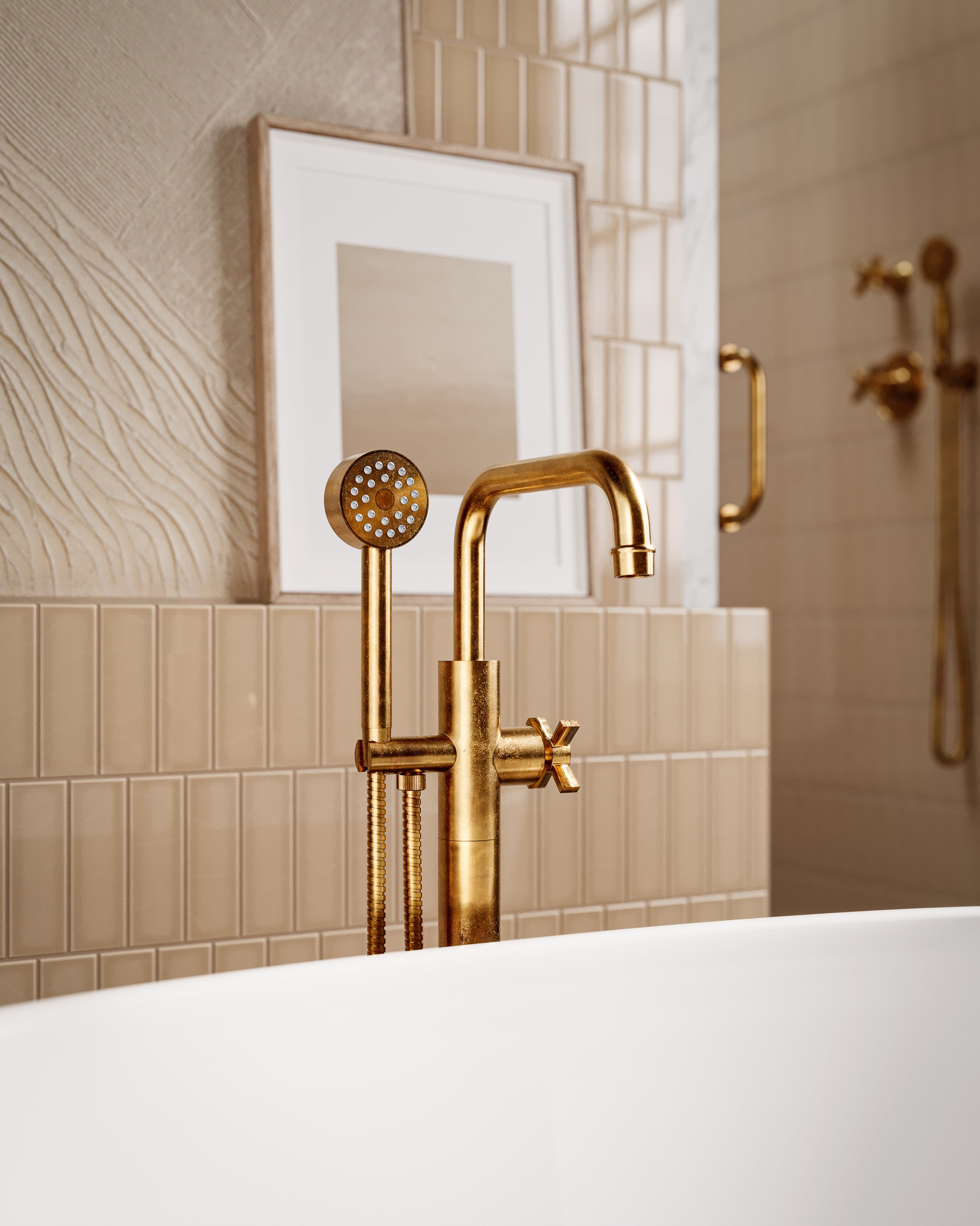 Emerson One Handle Floor Mount Squaretop Bath Trim with Hand Shower and Defined Cross Handle in Uncoated Polished Brass