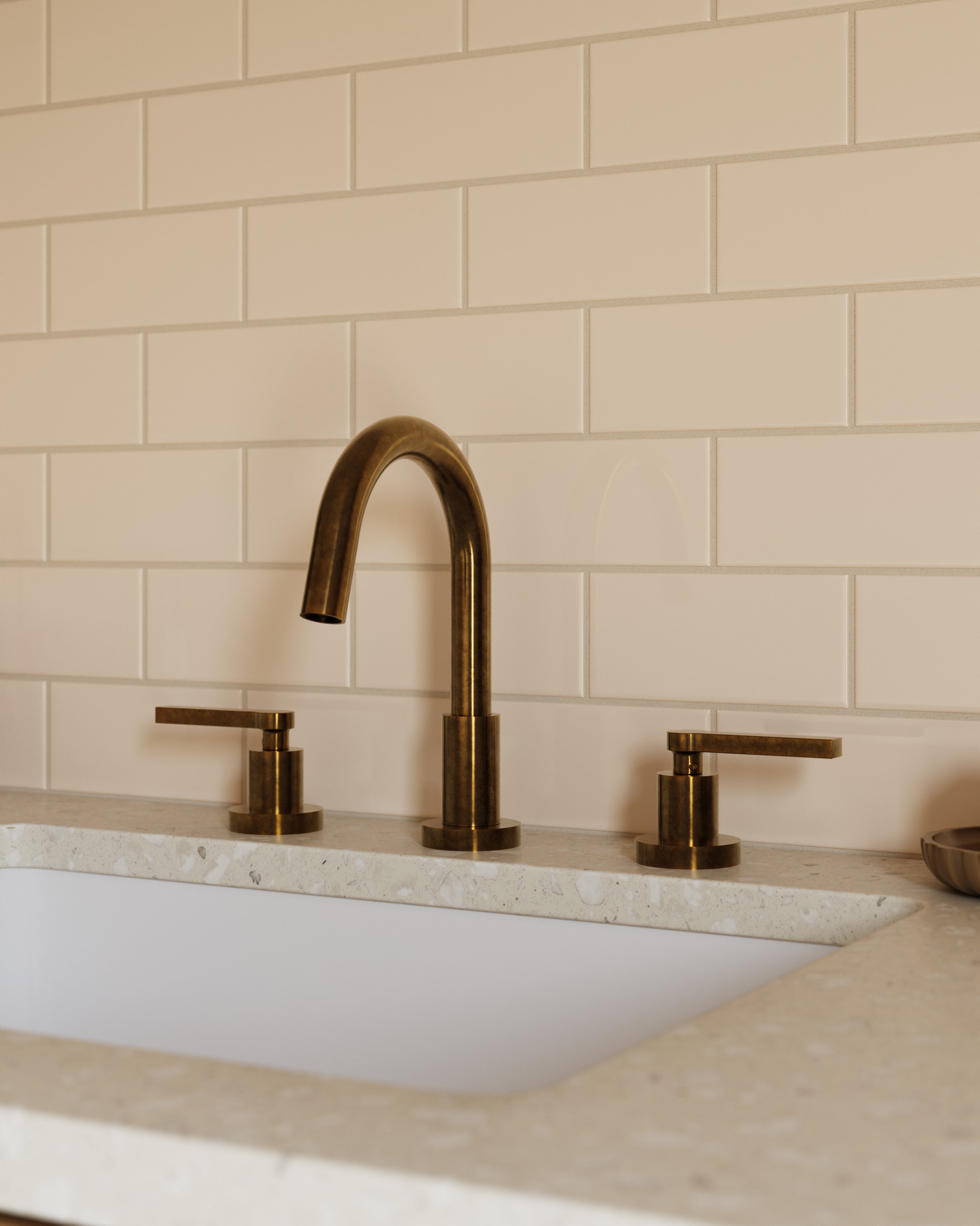 Flatiron Two Handle Deck Mount Short Gooseneck Lavatory Faucet with Linear Lever Handles in Uncoated Polished Brass
