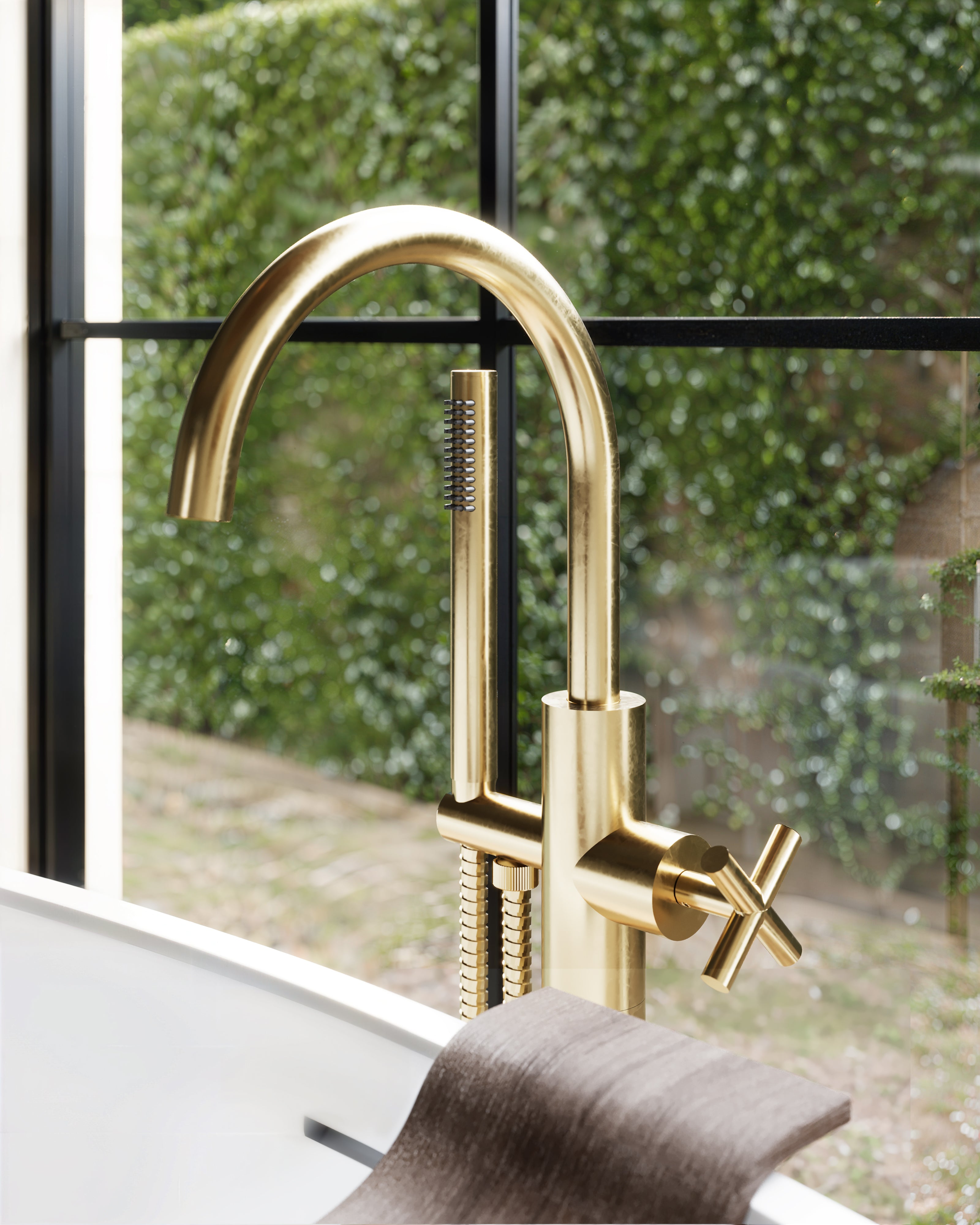 Contour One Handle Floor Mount Gooseneck Bath Trim with Hand Shower and Soft Cross Handle in French Brass